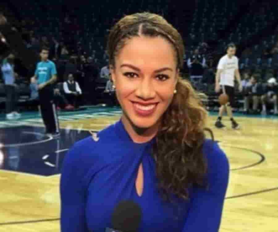 Rosalyn Gold- Onwude in blue dress at indoor Basketball Court.